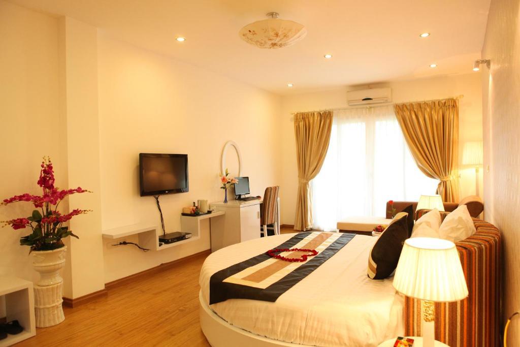 Splendid Star Suites Hotel Hanói Habitación foto